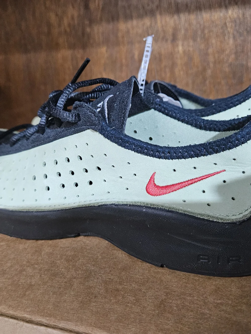 Nike Black and Sage Green Perforated Sneakers